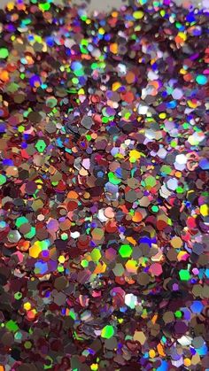 colorful holographics are scattered on the ground