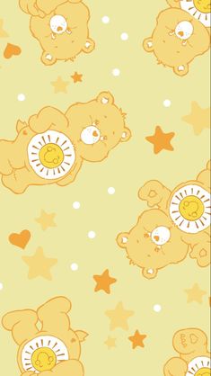 two brown teddy bears with stars on a green background