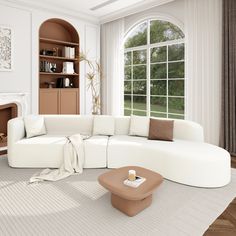 a living room with a large white sectional couch