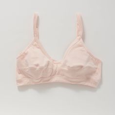 A more supportive style for larger cup sizes. Horizontal seams across the cups, fabric front straps and other thoughtful details shape and support—without sacrificing style or comfort. Designed with measurements from real women, not mannequins. Supports A-D cups. Slip-on style, no back closure. Adjustable straps with rose gold hardware. Double-layered, organic cotton with a covered elastic band. 94% organic cotton, 6% spandex. Cut and sewn in the U.S. Machine wash and dry. Size Guide Fitted Full Coverage Sports Bra With Built-in Cups, Supportive Full Coverage Bra With Built-in Cups, Fitted Full Coverage Nursing Bra With Adjustable Straps, Everyday Bra With Padded Cups, Fitted Nursing Bra With Removable Pads For Everyday, Fitted Full Cup Sports Bra, Fitted Full Coverage Sports Bra With Adjustable Straps, Supportive Nursing Bra For Everyday Use, Fitted Full Cup Sports Bra With Built-in Bra