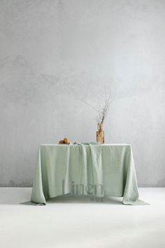 a table with a green cloth on it