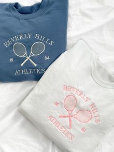 Add this cute Beverly Hills Athletics Crewneck Sweatshirt to your wardrobe! The Unisex Sizing makes the sweatshirt run slightly larger than your average sweatshirt for women. Most men find their normal size to be more snug. If you want a slightly looser fit, size up one size. PLEASE BE SURE TO INPUT YOUR CORRECT SIZE/COLOR + SHIPPING ADDRESS. We will not be responsible if it is incorrect! SHIPS OUT IN 1-2 WEEKS WE WILL NOT BE RESPONSIBLE FOR EXTRA SHIPPING FEES (VARIES IN COUNTRIES) AFTER ORDERI Sporty Text Print Sweatshirt For Spring, Blue Crew Neck Sweatshirt For Workout, Sporty Sweatshirt With Screen Print For Loungewear, Sporty Screen Print Sweatshirt For Loungewear, Athleisure Cotton Sweatshirt With Screen Print, Trendy Cotton Sweatshirt For Workout, Trendy Cotton Workout Sweatshirt, White Cotton Sweatshirt For Workout, College Sporty Soft-washed Sweatshirt