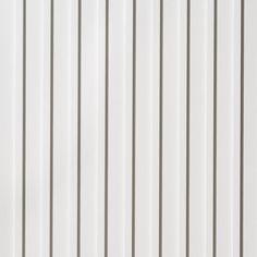 a white wall with vertical lines painted on it