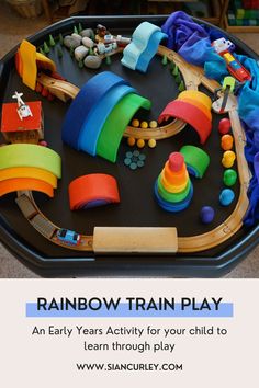 an early years activity for your child to learn through play with the rainbow train play