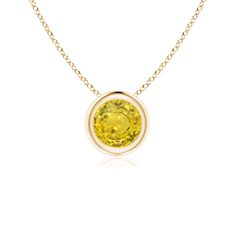 The round yellow sapphire shines bright like sunshine and appears to be floating on the chain. It is mounted in a 14k yellow gold bezel setting. This solitaire pendant is simple yet alluring. Yellow Gold Birthstone Necklace With Prong Setting, Yellow Gold Solitaire Necklace With Birthstone, Yellow Gold Round Birthstone Solitaire Necklace, Yellow Gold Solitaire Necklace With Tension Setting, Yellow Gold Solitaire Gemstone Necklace, Yellow Gold Round Solitaire Necklace With Gemstone, Classic Yellow Necklace With Round Pendant, Classic Yellow Round Pendant Necklace, Yellow Solitaire Round Jewelry