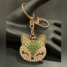 Bag Charm Gold Tone Crystal Kitty Face Green Bag Charm Keychain Mint Bch-1101 Bch-1102 Attention All Designer Lovers And Fashionistas! Elevate Your Bag's Style With This Must-Have Cat Purse Bag Charm Keychain. Crafted With High-Quality Materials, This Keychain Is Stylish And Durable. Featuring Gold Tone Crystal Cat, This Keychain Is Sure To Turn Heads And Make A Statement. Its Sturdy Metal Construction Makes It A Versatile Accessory That Can Be Used As A Keychain Or Decorative Addition To Your B Cute Gold Bag, Crystal Cat, Butterfly Bags, Cat Purse, Mint Gold, Backpack Charm, Charm Keychain, Green Crystal, Mint Color