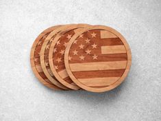 four wooden coasters with the american flag on them