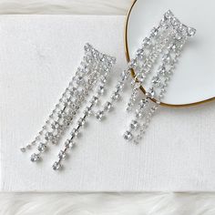 Our Boa Rhinestone Duster Earrings are statement making earrings that sparkle and shine with cascading layers of rhinestones. Perfect for when you want to add that final touch that will catch the spotlight, these glamorous earrings are perfect for parties, music festivals, and dancing through the night! About 5 inches long 925 Silver Post - can be a bit flexible This is a special occasion item = FINAL SALE Glamorous Earrings, Cascading Layers, Duster Earrings, Serpent Ring, Face Gems, Ear Jacket Earring, Making Earrings, Sparkle And Shine, Ring Sale