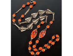 "One of a kind Bohemian glass necklace from Art Deco period. It is 28\" long. 2 oval orange millefiori glass beads wired with filigree caps are 1\" x 1/2\", orange round beads 1/4\", embossed silver over brass \"wing\" links 3/4\" x 1/2\". Spring ring clasp Silver plating is slightly worn on the back of the necklace. The color of the beads is more orange then it appears on the photos. No chips or cracks on the glass. Very good vintage condition." Antique Orange Beaded Jewelry, Antique Orange Jewelry With Round Beads, Vintage Orange Oval Beads Jewelry, Antique Oval Orange Jewelry, Antique Orange Oval Jewelry, Orange Oval Antique Jewelry, Pewter Dress, Czech Glass Necklace, Necklace C