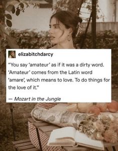 a woman sitting at a table with an open book in front of her and the caption that reads, elizabethdry you say's amateur as if it was a dirty word