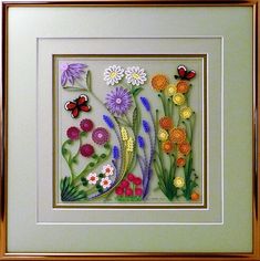 a painting with flowers and butterflies on it