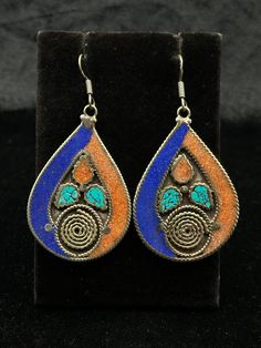 A Beautiful Vintage Tibetan Nepalese Beautiful Earring With Lapis Lazuli Turquoise Coral & Sterling Silver Hooks. Shipping Payment Feedback & Return Policy 1 : We ship Monday to Friday Via Airmail Register Insured  With Tracking # takes 2 to 4 Weeks to Destination. 2 : Contact us if you did not receive your item after 4 weeks. 3 : We Accept Payment From Most of the Mainstream Payment Methods. 4 : In Any Inconvenience Case we do Accept Return and full Refund. 5 : We Ship worldwide via Airmail Reg Blue Festival Earrings With Latkans, Blue Teardrop Earrings For Festival, Coral Stone, Coral Turquoise, Lapis Lazuli, Beautiful Earrings, Jewelry Earrings Dangle, Dangle Drop Earrings, Dangle Earrings