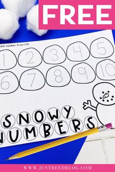 a snowy number worksheet with cotton balls and a pencil on the table