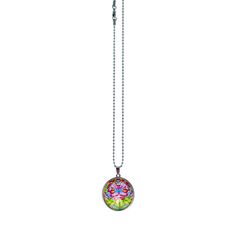 Embrace your groovy spirit with our Green Goddess Big Round Necklace! This exquisite handmade art glass charm, adorned with vibrant green and purple-pink leaves, sprinkled with hints of blue and yellow, radiates psychedelic, hippie vibes. The 30mm, 1.2 inch, charm, encased in a durable, surgical grade stainless steel bezel, celebrates the beauty of nature's greenery in a stylish and unique way. Get ready to turn heads and ignite conversations with this far-out accessory that's as free-spirited a Green Bohemian Crystal Necklace With Round Beads, Bohemian Personality, Green Round Pendant Crystal Necklace For Spiritual Use, Bohemian Green Heart-shaped Necklace, Spiritual Green Crystal Round Pendant Necklace, Spiritual Multicolor Cabochon Necklace, Hippie Vibes, Pink Leaves, Green Goddess