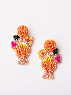 Get tropical with our brand new Daiquiri Earrings! These seed bead earrings take the shape of your favorite summer drink and make a fun and colorful addition to your vacation wardrobe! Seed bead daiquiri drink earrings 2" Brass plated Hypoallergenic Surgical steel posts Nickel and lead-free Summer Party Beaded Earrings With Dangling Beads, Summer Party Beaded Drop Earrings, Fun Beaded Dangle Earrings For Beach, Casual Summer Party Earrings, Summer Party Beaded Dangle Earrings, Summer Orange Beaded Earrings As Gift, Dangle Beaded Earrings For Summer Parties, Orange Beaded Earrings For Summer Gift, Fun Beaded Earrings For Beach In Summer