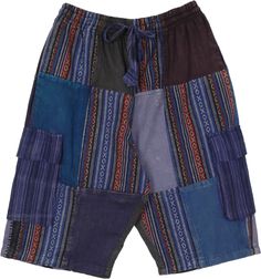 These summer unisex Bermuda style shorts are made from heavy weight woven cotton, inspired by the hill tribes of the Himalayas and handwoven on looms in the Kathmandu Valley.  These shorts feature two side pockets and two deep cargo pockets, elastic waist with drawstrings and they are extremely comfortable in any setting. #tlb #Patchwork #Pocket #vacationclothing #beachwrap #bohemianfashion #HippieBermudaShorts #BohoPatchworkShorts #UnisexBohoShorts #Wovencottonbermudashorts #menshalfpants Blue Cotton Patchwork Shorts, Traditional Cotton Shorts For Summer, Blue Cotton Festival Shorts, Bohemian Blue Shorts For Festival, Blue Bohemian Shorts For Festival, Blue Bohemian Style Shorts For Festival, Blue Bohemian Festival Shorts, Traditional Blue Summer Bottoms, Hippie Boy Outfits