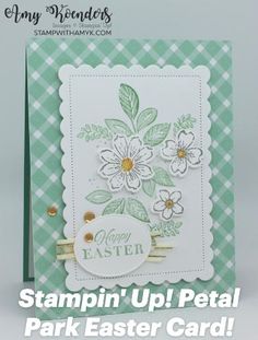 a green and white card with flowers on the front, says happy easter written in gold