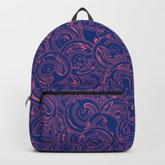 a blue and pink backpack with swirls on it