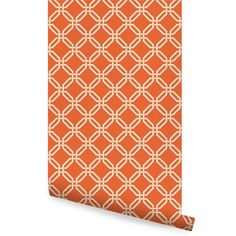 an orange and white wallpaper with geometric design on it's side, in the style