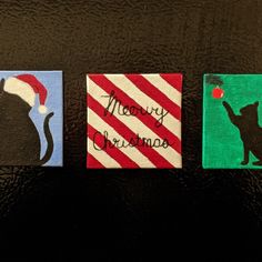 three square magnets decorated with cats and santa hats