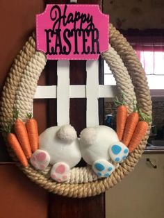 a happy easter wreath with carrots and bunnies