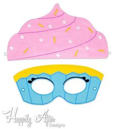 two pink and blue masks with donuts on them