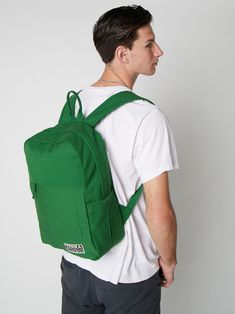 Need a backpack that's both sustainable and practical for college, school everyday use or outdoor activities? Our Earth Backpack is perfect for you. Our spacious and durable Earth Backpack is the workhorse of our line, built for everyday carry with heavy-duty certified organic cotton canvas. The generous main compartment is divided with a no-fuss sleeve for your laptop and one small interior pocket to keep things organized. Two water bottle sleeves and the large zippered exterior pocket keep hyd Functional Backpack For Everyday And Back To School, Functional Everyday Backpack For Back To School, Canvas Backpack For Back To School, Green Backpack With Pockets, Urban Backpack For Everyday Use And Back To School, Cotton Backpack For Daily Use, Functional Cotton Backpack For Back To School, Functional Canvas Backpack For Back To School, Urban Green Backpack For Everyday Use