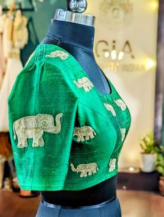 Bright green rawsilk hand embroidered elephant blouse that can be paired with multiple sarees. size: please choose the size from the drop down. if you want custom measurements,  I'll send you the measurements sheet when you order.  Please contact me if you have any questions Embroidery Design Blouse, Elephant Embroidery Design, Maroon Lehenga, Elephant Embroidery, Embroidered Elephant, Embroidery Blouses, Multicolor Sequins, Latest Model Blouse Designs, Design Blouse