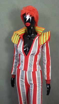 "The perfect costume for any David Bowie fan! This costume is completely handmade. I could not find any stripe fabric that even comes close to the original so I had to create my own stripes! The whole costume is made from 100% shimmering Lycra for a comfortable and nice fit. The colors are : Red Silver Metallic - **Please note that I am replacing the Ivory stripes that you see in the photo with Silver Metallic that is use for the mens version of this costume** Grey Neon Green Neon Orange It is a Fitted Multicolor Cosplay Costume, Fitted Multicolor Costumes For Cosplay Events, Multicolor Fitted Costume For Cosplay, Fitted Multicolor Cosplay Costume For Costume Party, Red Fitted Cosplay Sets, Red Fitted Costume Set, Fitted Red Costume Set, Red Fitted Costume Party Set, Red Fitted Sets For Costume Party