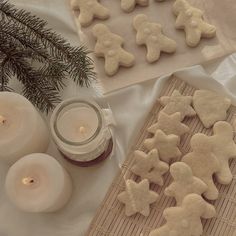 some cookies and candles on a table