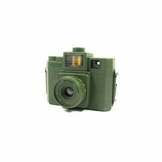 an old green camera on a white background