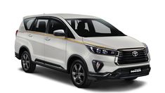 the new toyota innova is shown in white and gold stripeing on it's front end