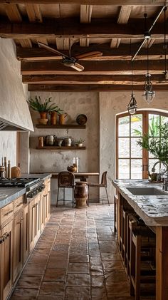 a kitchen with wooden cabinets and tile flooring