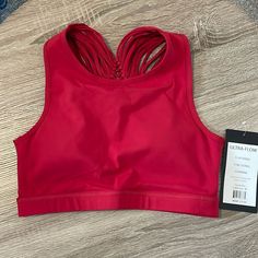 Color: Cabernet Red New With Tags Removable Pads Super Cute Back! Red Sleeveless Sports Bra With Built-in Bra, Red Sports Bra For Summer, Red Sleeveless Bra-friendly Top, Red Sports Bra With Built-in Bra, Red Sports Bra With Built-in Bra For Summer, Red Fitted Sports Bra With Built-in Bra, Spring Bra-friendly Red Top, Red Bra-friendly Top For Spring, Red Fitted Sports Bra For Summer