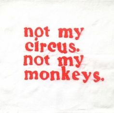 a white napkin with red writing that says not my circus, not my monkeys