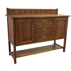 a wooden sideboard with drawers and shelves