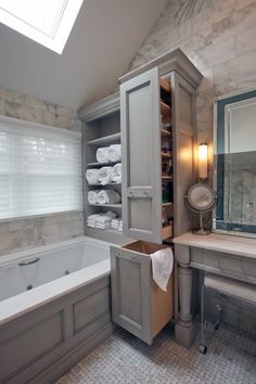 a bathroom with a sink, mirror and bathtub in it's corner next to a window