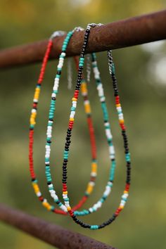 ONE  "beaded necklace" is a statement piece.  This necklace is 14 inches with a two inch extension. This hand-assembled beaded necklace is a perfect addition to any punchy outfit. Perfect for any occasion whether this is going to a rodeo or a horse sale. This necklace includes an extension chain. If you would like a longer length, please message me! I would love to help you design your perfect necklace. I am more than happy to customize any order. Please feel free to ask me any questions and/or Multicolor Southwestern Beaded Necklace With Beaded Chain, Multicolor Southwestern Beaded Necklace, Multicolor Southwestern Style Beaded Necklace, Southwestern Multicolor Beaded Necklace, Southwestern Heishi Bead Colorful Necklaces, Southwestern Heishi Beaded Colorful Necklace, Southwestern Multicolor Heishi Beaded Necklaces, Southwestern Style Colorful Heishi Beaded Necklaces, Multicolor Southwestern Heishi Beaded Necklace