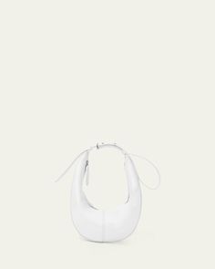 Proenza Schouler "Slide" shoulder bag in smooth napa leather     Adjustable shoulder strap    Zip top closure     Lining: Cotton    Approx. 8.7"H x 15.9"W x 4.5"D    Leather method dry cleaning    Made in Italy Proenza Schouler, 7 H, White Bag, Zip Top, Dark Red, Leather Shoulder Bag, Shoulder Strap, Tops Designs, In Italy