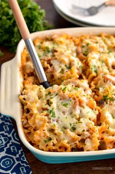 a casserole dish filled with meat and cheese