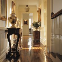 the hallway is clean and ready for us to use as an entrance way in this house