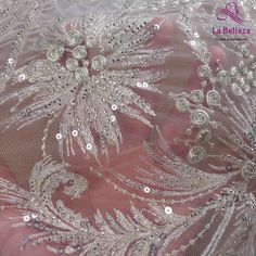 Price: The price is for 1 yard. if you buy more than 1 yard ,it won't be cut. will come in one piece the longest is 20 yards. Material: polyester,sequins,beads Fixed Wide : 120cm or 47 inches. color:silver,Off white Want to see other colors and more similar Beading lace fabrics come to: https://www.etsy.com/shop/Randyfabrics?ref=hdr_shop_menu&section_id=14192305 Shipping: Choose the shipping way you need, if you want package shipped by express,please note the phone number on order. Use for D Elegant Silver Lace With Intricate Embroidery, Elegant Silver Embroidered Fabric With Lace Work, Elegant Silver Lace Embroidered Fabric, Elegant Silver Embroidered Lace Fabric, Elegant Silver Lace Tulle Fabric, Elegant Silver Lace With Sequins, Elegant Silver Lace For Wedding, Elegant Silver Lace With Lace Work, Silver Lace Tulle Fabric For Wedding