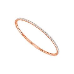 Wrap her wrist in the unparalleled sparkle of round shape diamonds in this dramatically beautiful piece. The infamous diamond tennis bangle bracelet that elevates any look. Available in 14k White Gold, Rose Gold And Yellow Gold with 62 round diamonds, 2.63 Ct. Tw., Clarity: I1, Color: I - J. This diamond bracelet features brilliant cut round diamonds set in prong setting, straight line design, offering the perfect mix of glamour and sophistication. Complete with our secure safety clasp, wear this timeless piece as your everyday signature piece for that extra touch of sparkle. Take your arm stack to another level with this breath-taking bracelet!   PRODUCT INFORMATION Metal Content: 14k Metal Color: White Gold, Rose Gold, Yellow Gold Style: Fancy STONE INFORMATIONNumber of Stones: 62Shape: Straight Line Design, Straight Line Designs, Round Diamond Setting, Fancy Stones, Pink Bracelet, Infamous, Gold Style, Gold Rose, Delicate Bracelet