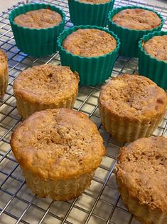 several muffins cooling on a wire rack