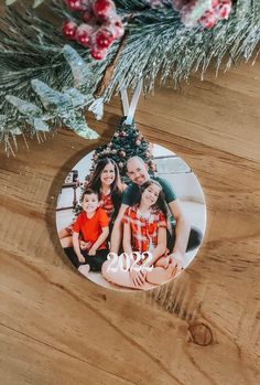 a christmas ornament hanging from a tree