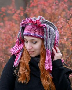 Winter Shaman Crochet Hat Festival Costume Headdress Pink - Etsy Russia Handmade Bohemian Costume Hats For Winter, Hand Knitted Crochet Hat For Winter Festivals, Winter Crochet Costume Hats And Headpieces, Winter Bohemian Yarn Hat, Hand Knitted Pink Hat For Festival, Bohemian Yarn Hats For Winter, Bohemian Winter Yarn Beanie, Bohemian Yarn Beanie For Winter, Pink Crochet Hat For Festival