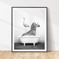 a black and white photo of a zebra in a bathtub with a flamingo