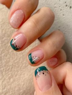 If you’re tired of the usual red but still wanna rock some Christmas vibes, try going for emerald green French tips with a dash of colorful glitter. That green looks fancy on the tips, totally bringing out the festive feel. Source: Pinterest (@Fab Mood) #ChristmasNails #HolidayNailArt #FestiveNails #XmasNailDesigns #WinterNailInspiration #ChristmasManicure #HolidayNailTrends #SeasonalNails #ChristmasNailIdeas #MerryManicures Christmas Nails Trendy, Short Christmas Nails, Xmas Nail Designs, Christmas Nail Colors, Christmas Gel, December Nails, Red Christmas Nails, Tree Nails, Winter Nails Acrylic