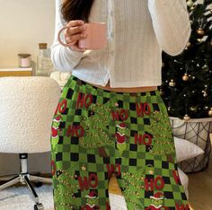 🎄🧸Celebrate the holiday season in style with our Grinch Christmas-themed striped pajama bottoms. Made from 100% brushed polyester, these pajama bottoms offer a cozy, luxurious feel that's perfect for lounging or relaxing at home. The soft, stretchy fabric drapes comfortably, while the festive stripes come to life in vivid detail and color. They make a great gift for loved ones or yourself, adding a festive touch to your Christmas season. Features: 100% brushed polyester for a soft, cozy feel L Christmas Holiday Long Pants Sleepwear, Christmas Holiday Sleepwear With Long Pants, Casual Christmas Holiday Pants, Casual Holiday Pants For Christmas, Casual Long Pants For Holiday, Christmas Loungewear Pants, Casual Christmas Holiday Bottoms, Casual Christmas Loungewear Bottoms, Striped Pajama