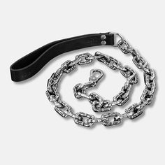 a black and white photo of a chain with a knife on the end of it